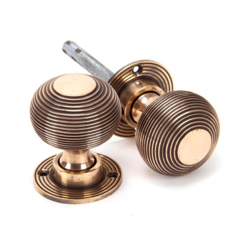 HEAVY REEDED MORTICE / RIM DOOR KNOBS ON FACE FIXED ROSE