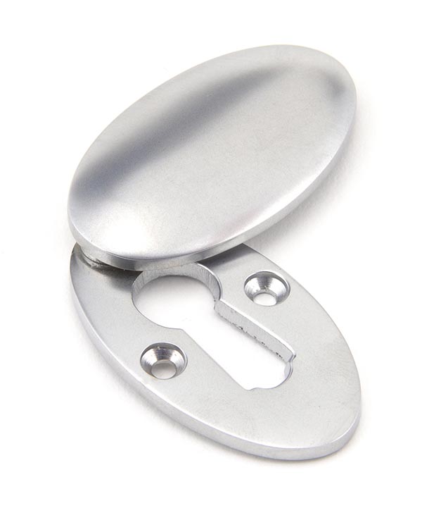 OVAL SHAPED COVERED LOCK ESCUTCHEON