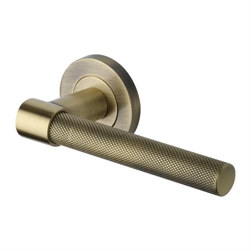 PHEONIX KNURLED LEVER HANDLE ON ROUND ROSE