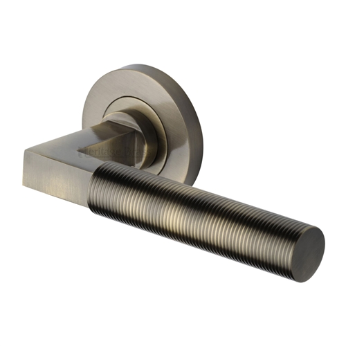 SPECTRAL REEDED LEVER HANDLE ON ROUND ROSE